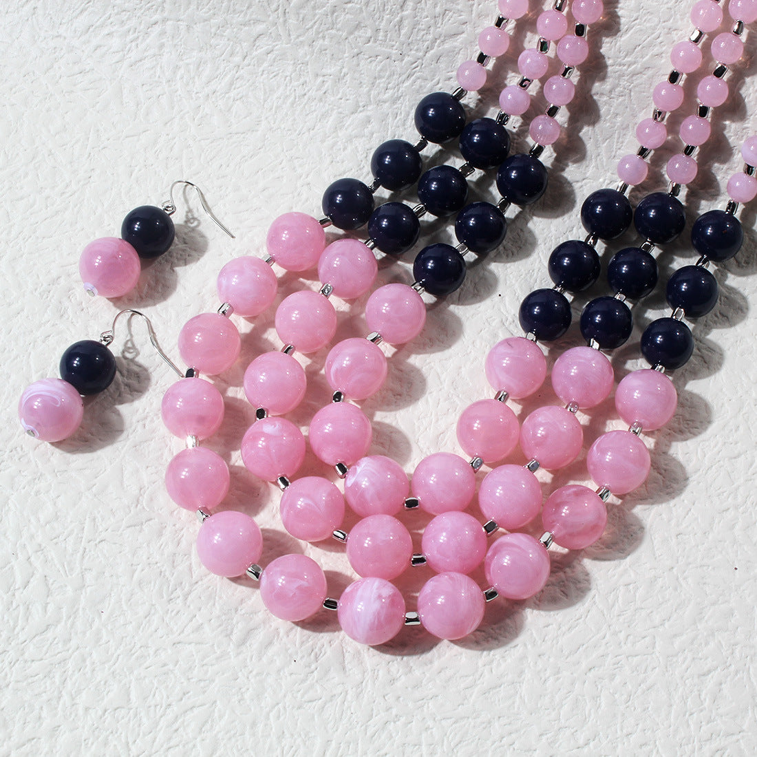 Venta al por mayor de plástico multicapa exagerada pendientes collar conjunto de joyas